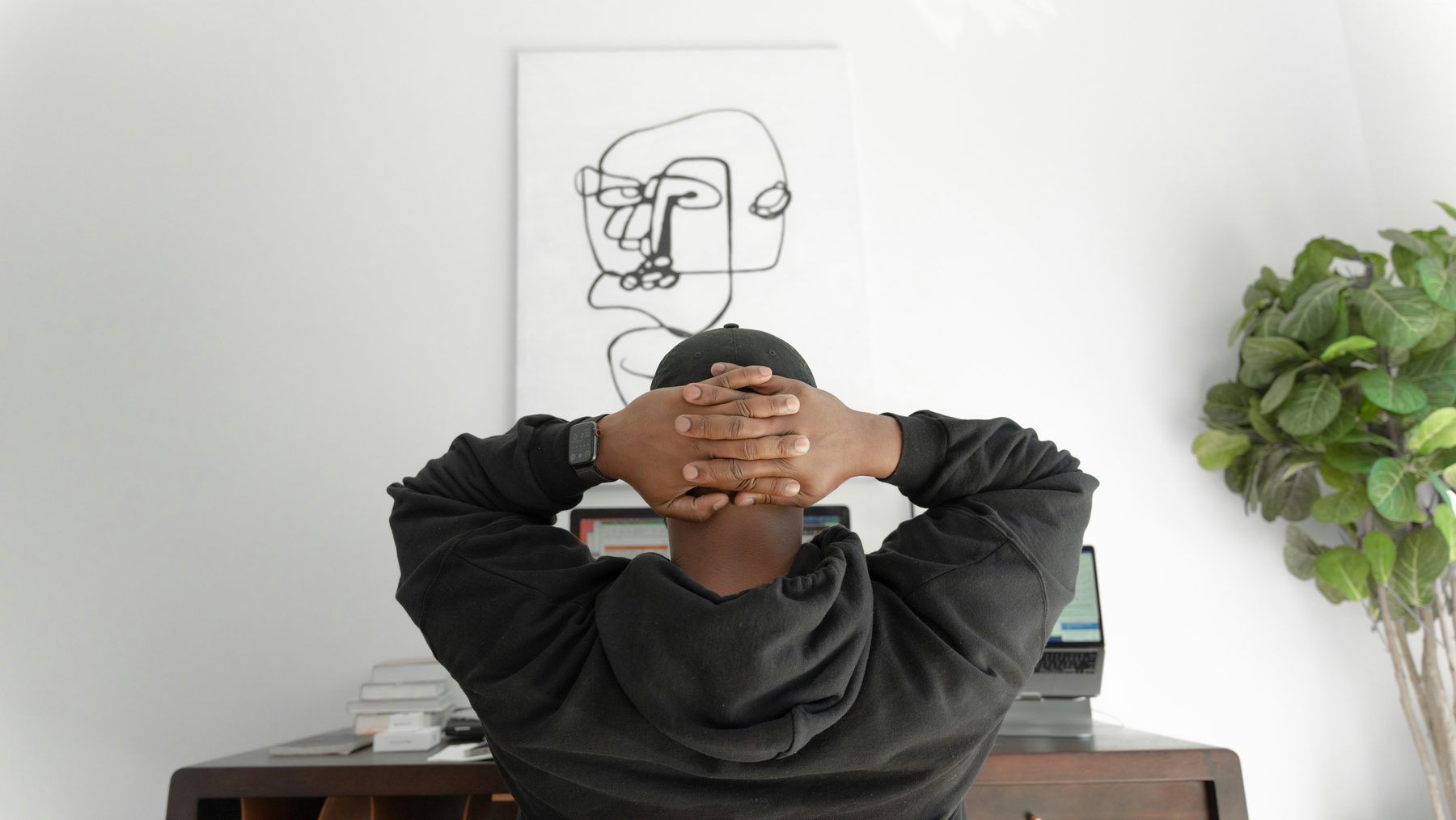 A relaxed freelancer at his desk